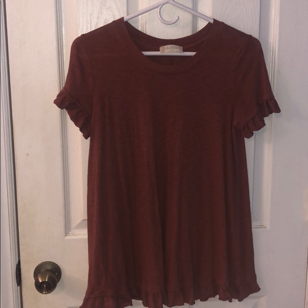 a burnt red flowy tee shirt!!